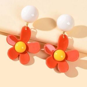 3 for $20 SHEIN FLOWER DECOR DROP EARRINGS. Color: orange ,yellow and white.